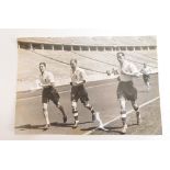 An original 1938 German press photograph of England football players in training,