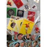 Football: a quantity of loose coins, metal Esso badges, pin badges, coins, cards, first day covers,