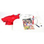 A white Gary Lineker autographed England football shirt by Umbro, signed to the front by Lineker,