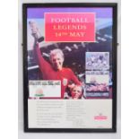A framed 1966 World Cup, Football Legends poster of Bobby Moore, produced in 1996,