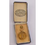 Lancashire Football Association; a 9ct gold medal awarded to G.W.