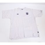 A white David Beckham autographed England football shirt by Umbro,