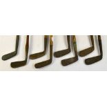 A group of eight vintage hickory shafted and brass headed golf clubs (8).