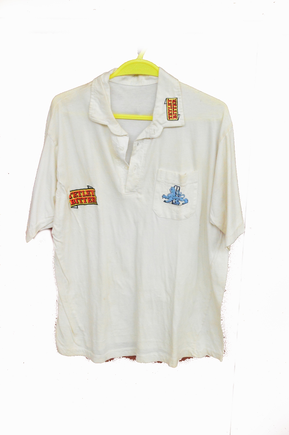 A multi-signed cricket jumper, and a training shirt, both belonging to Dermot Reeve,