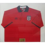 A red Jamie Redknapp autographed England football shirt by Umbro, signed to the front by Redknapp,