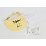 TIGER WOODS; a Titleist golf visor signed by Tiger Woods, with certificate of authenticity.