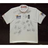 A signed England Ashes victory cricket shirt in glazed display case.