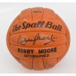 A Bobby Moore autographed football, The Spall Ball, autographed in ink by Bobby Moore, Geoff Hurst,