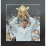 NOVAK DJOKOVIC; an autographed photograph of the world number one tennis player,