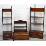 Two small similar modern bookcases/units with pierced sides, height of largest 110cm,