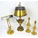 A brass desk lamp,