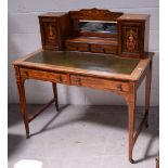 A 19th century rosewood and satinwood bonheur du jour with small central mirror with ornate frieze