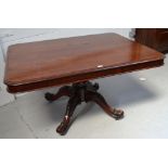 An early Victorian mahogany breakfast table of rounded rectangular form,