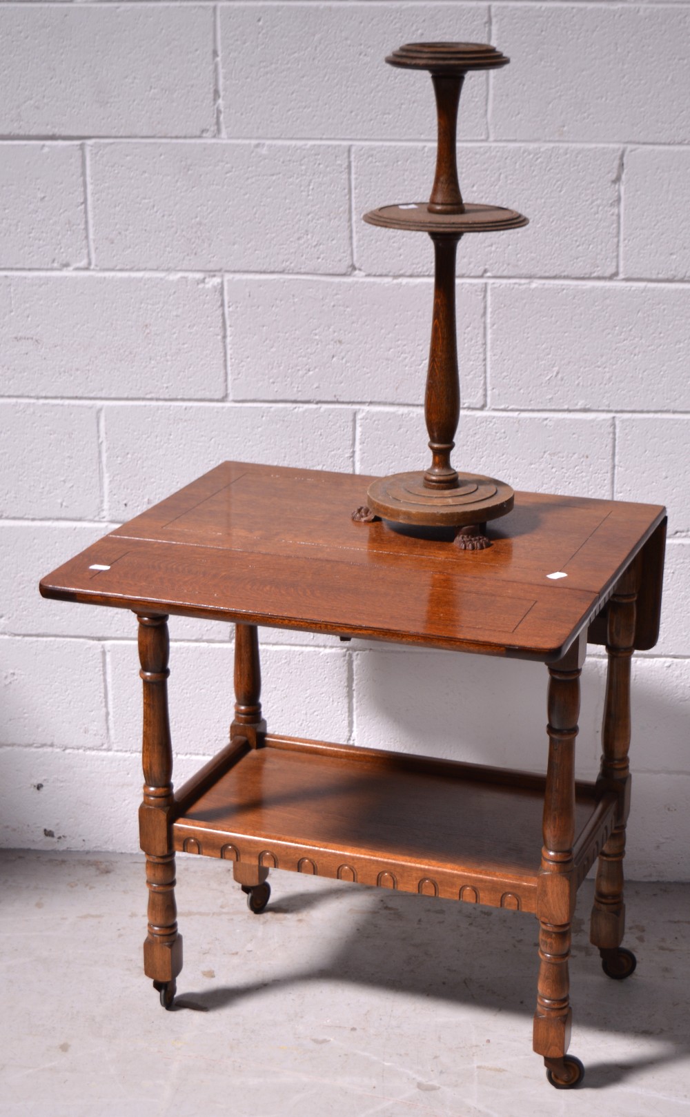 A 1940s oak tea trolley,