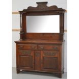 An early 20th century walnut mirror back sideboard, width 135cm.