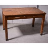 A mid 20th century oak writing desk of simple form, width 120cm.