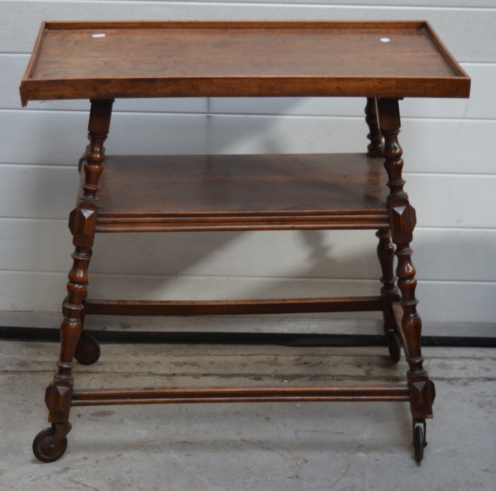 A c1900 mahogany tea trolley, width 79cm.