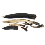 Two sets of Indian kukri knives, both with original scabbards.