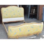 A French double bed upholstered in Sandersons 'Finches' pattern fabric,