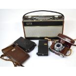 A cased Houghton and Butcher of London Ensign camera,