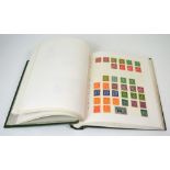 A Green Viscount stamp album containing a quantity of German stamps.