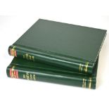 Two green Merton stamp albums containing a quantity of Bulgarian stamps.