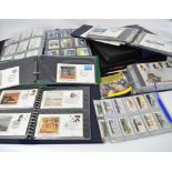 A quantity of first day covers contained within folders to include a 1982 'Maritime England'