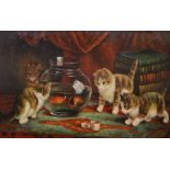 M HANSON; an oil on board of kittens playing with goldfish in a bowl, 18.5 x 39cm.