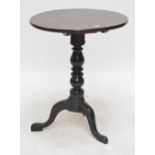 A 19th century mahogany circular tilt top table on ring turned column with tripod base,