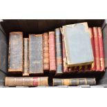 A large quantity of books, the majority 19th century with decorative leather bindings.