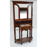 An Edwardian walnut hall stand,