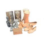 A collection of 1940s African items including figural wood carvings including bookends,