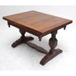 An early 20th century oak drawleaf table with rectangular top, 91 x 121cm,