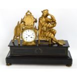A late 19th century French gilt spelter and black slate mantel clock,