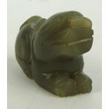 A 20th century Chinese carved jade figure of a dog, length 4.5cm.