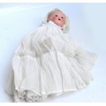 An early 20th century Armand Marseille bisque headed doll stamped "AM Germany 351./5.K.