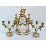 A late 19th century French marble gilt metal mounted three piece clock garniture,