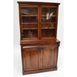 An early 20th century mahogany two section bookcase,
