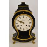 A 19th century French mantel clock of shaped form with black lacquer and floral decoration and