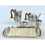 A five piece Picquot Ware tea service comprising teapot, hot water jug, sugar bowl,