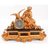A late 19th century gilt spelter figural mantel clock with drum type eight day movement,