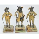 A pair of bronzed figures of Charles I and Charles II on squared onyx bases,