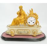 A late 19th century French gilt metal and onyx figural mantel clock,
