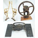 A pair of early 20th century cast iron cinema seat/garden bench frames, height 80.