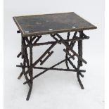 An early 20th century rectangular bamboo occasional table with lacquered top, width 62cm.