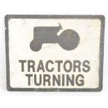 A cast alloy Tractor Turnings sign, width 49cm.