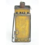 A late 19th/early 20th century brass carriage travelling lamp of rectangular form with adjustable