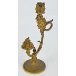 A decorative ormolu early electric table lamp with cast mask and fruit basket,