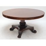 A large early Victorian mahogany breakfast table,