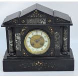 A late 19th century French black slate and marble set mausoleum type mantel clock with circular